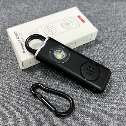 Osobni alarm ARIZA 2004, privjesak, LED svjetlo, punjiva baterija, crni